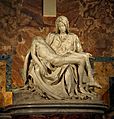 The Pietà by Michelangelo is the most famous artwork in St. Peter's. It shows the Virgin Mary holding the body of her son, Jesus.