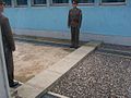 The concrete boundary in Conference Row, JSA, that signifies the Military Demarcation Line (MDL) between the two Koreas.