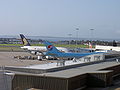 A Singapore Airlines Airbus A380 and a Korean Air Boeing 747 on the tarmac