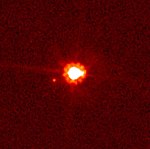 Eris &amp; Dysnomia (planeten er rød)