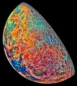 This image shows compositional variations of the Moon overlaid as pseudocolor. Bright pinkish areas are highlands materials, blue to orange shades indicate volcanic lava flows. Recent impacted soils are represented by light blue colors; the youngest craters have prominent blue rays extending from them.