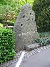 Marking of the 49th parallel in the city garden