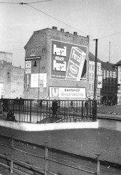 Tram platform, western subway entrance and Persil advertisement at Alexanderplatz in East Berlin, 1951