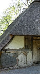 Foundation and wall made of large field stones of a sheep barn in the museum village Cloppenburg