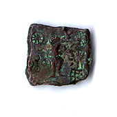 Depiction of Kartikeya and Lakshmi on a coin; Ujjain; c. 150-75 BC.
