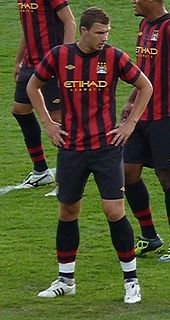 Džeko s Manchesterem City.  
