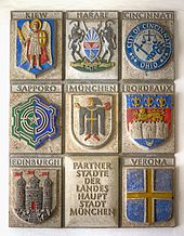 Wall sculpture of Munich's twin cities in the New Town Hall