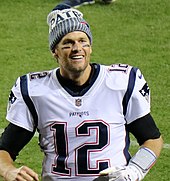 Základní rozehrávač New England Patriots Tom Brady