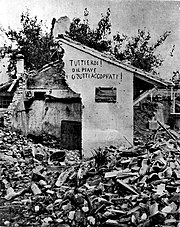 Second Piave battle, house wall with an inscription later famous in Italy (Eng: Everyone is a hero! Either the Piave, or all killed!).