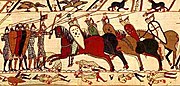 Část tapiserie z Bayeux zobrazující bitvu u Hastingsu, která se odehrála 14. října 1066.
