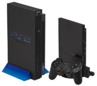 Slimline (right) and Original (left) PS2 consoles