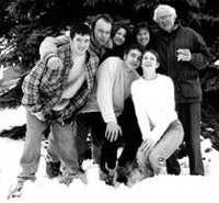 Sanders com a sua família no c.  1993