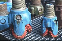 Deep drilling roller bits with 3 toothed bevel gears each