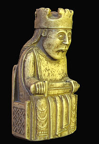 Un rege de pe tabla de șah din Insula Lewis (sec. XII, British Museum)