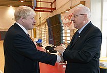 Johnsonas su Izraelio prezidentu Reuvenu Rivlinu, 2015 m. lapkričio mėn.