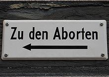 Historical toilet signpost