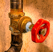 Limescale deposits on a leaking shut-off valve