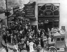 People line up outside American Union Bank to liquidate their bank balance (bank run).