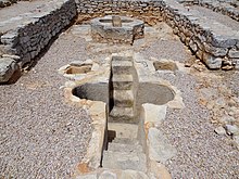 Baptistery with baptismal font in the basilica of Son Peretó