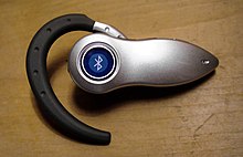 Tipinės "Bluetooth" ausinės, skirtos prijungti prie mobiliojo telefono