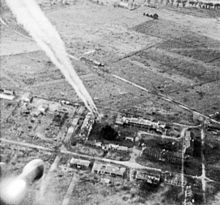 An air-to-ground missile is fired by a Typhoon of the Royal Air Force's 181st Squadron over Carpiquet airfield