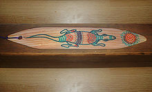 Tjuringa whirling wood of the Aborigines with painted totem