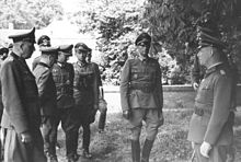 Briefing of officers, including Colonel General Friedrich Dollmann (left), Lieutenant General Edgar Feuchtinger (2nd from right) and Field Marshal Erwin Rommel (right) in northern France, 1944.