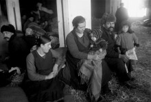 German-Russian peasant family with the rest of their belongings in Kiel, where they are accommodated and fed until their onward journey to Canada, November 1929