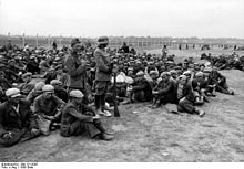 Interned Jews near Krakow, around the end of 1939 (photograph from the Federal Archives)
