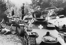 On the left, Panzer-Kampfwagen I and II advancing near Bromberg in the Polish Corridor, September 1939. On the right, in Sd.-Kfz 251 with device for a sunshade, General Heinz Guderian.
