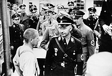 Propaganda photo: Himmler visiting Dachau concentration camp, 1936.