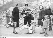 Postman with letters and parcels 1946 in Berlin
