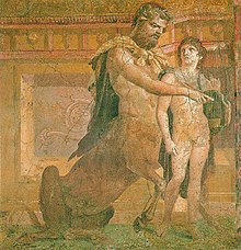 Cheiron teaches the young Achilles how to play the kithara. Ancient Roman fresco from the Augusteum (the so-called basilica) in Herculaneum. National Archaeological Museum of Naples