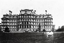 President William Howard Taft's award-winning Holstein cattle Pauline Wayne in front of the building.