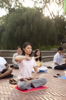 Falun Gong practitioners do the fifth exercise, a meditation, in Manhattan.