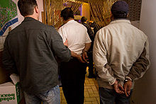 German plainclothes patrol in Frankfurt am Main arrests suspected moonlighters in a restaurant