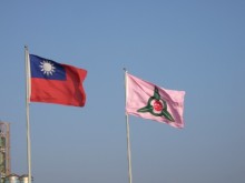 Flag of the city (right) and national flag at the waste depot Hsinchu