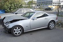 Deformed crumple zone in a Mercedes-Benz R170; the passenger cell is still intact here