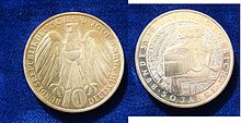 50 years of the Federal Constitutional Court . The last coin of the Mark currency (2001), designed by the artist Aase Thorsen.