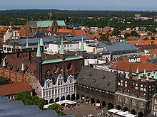 ... and the historical town hall standing in the angle at the market next to the church Marienkirche