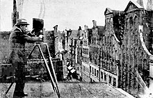 The operator taking pictures of the gabled houses in Wahmstraße.