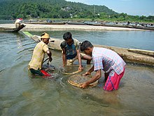 Gemstone washer at the Piyain River in Jaflong ­(Sylhet District, Bangladesh, 2009)