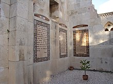The Lord's Prayer in Hungarian Romani (Beás, left) in the Paternoster Church of Jerusalem