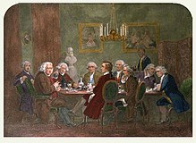 Literární večírek u sira Joshuy Reynoldse. Osoba v modrém plášti vpravo je Oliver Goldsmith - k identifikaci ostatních použijte kurzor.