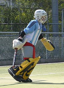 Portero con palo de jugadores  