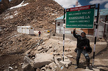 Local sign with questionable pass height of 5602 m.