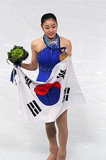 Kim alla cerimonia delle medaglie delle Olimpiadi invernali 2010.