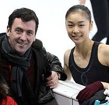 Kim e il suo allenatore alla finale del Grand Prix 2007-2008.