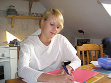 Health care worker and nurse at the desk work