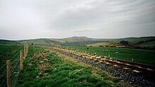 Von 210 m (700 Fuß) auf dem Exmoor mit Blick auf die Hügelkuppen und darüber hinaus auf das Meer...